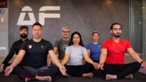 anytime fitness members doing yoga in Anytime fitness club